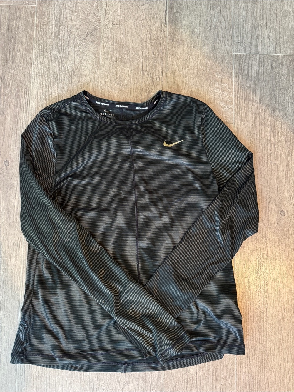 Nike Black Long Sleeve Performance Top with Gold Swoosh